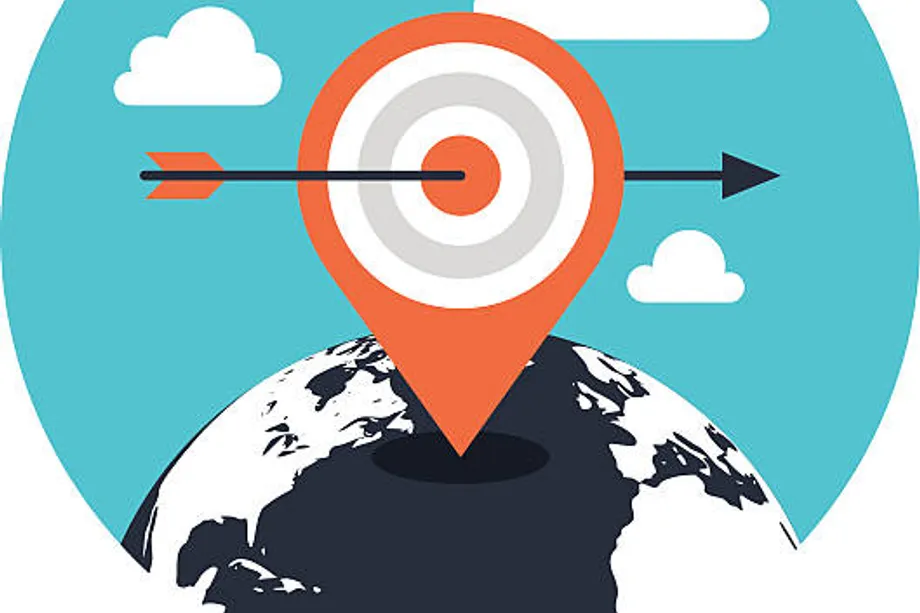 Illustration of a location pin with a bullseye target and arrow piercing through it, placed on top of a globe, representing geo-targeting for location-based digital marketing.